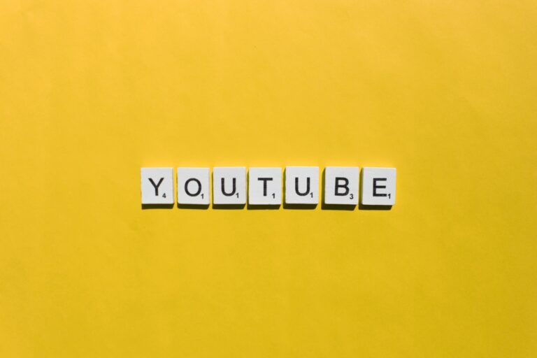 YouTube scrabble letters word on a yellow background